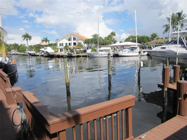 a balcony with trees in front of it