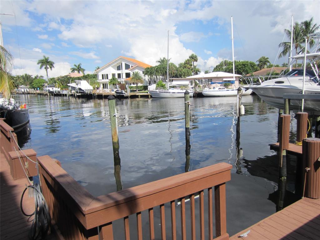 1421 South Ocean Boulevard, Unit 310 Pompano Beach, FL 33062 - Photo 14 of 26 a view of a lake from a balcony