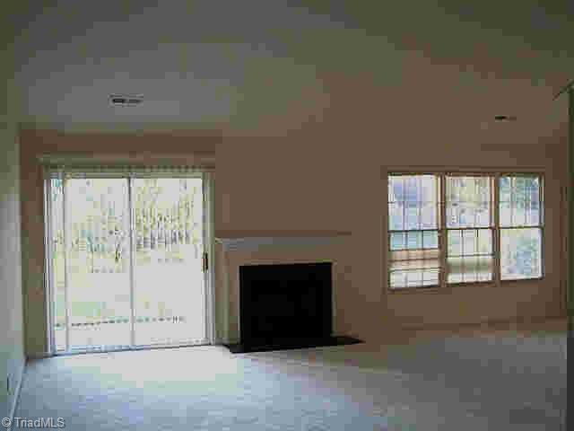 3402 Timberwolf Avenue High Point, NC 27265 - Photo 7 of 9 Other. Great room with vaulted ceiling & wood burning fireplace.