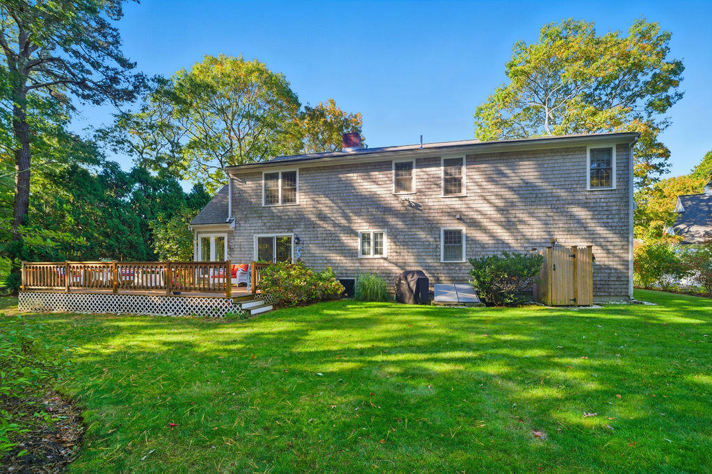 42 Eventide Lane Hyannis, MA 02601 - Photo 17 of 39 front view of a house with a yard