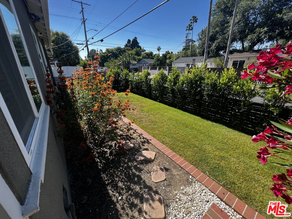 5757 Vesper Avenue Van Nuys, CA 91411 - Photo 23 of 26 a view of a garden with flowers