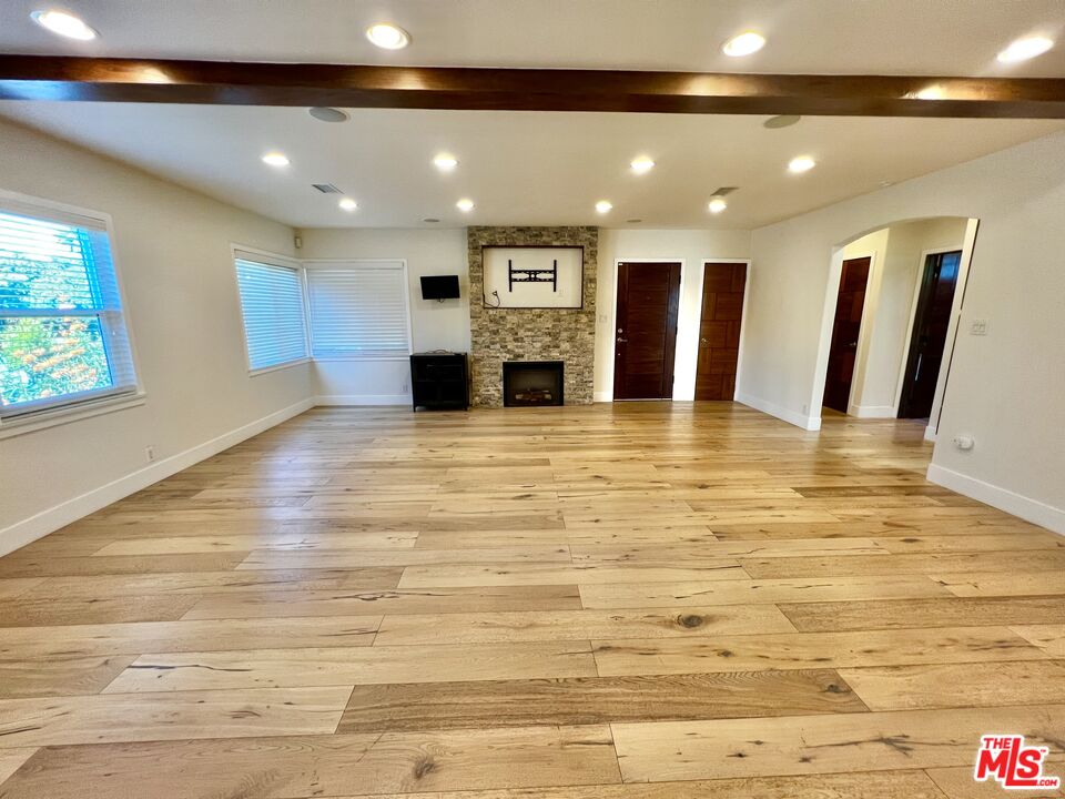 5757 Vesper Avenue Van Nuys, CA 91411 - Photo 3 of 26 a view of a room with wooden floor