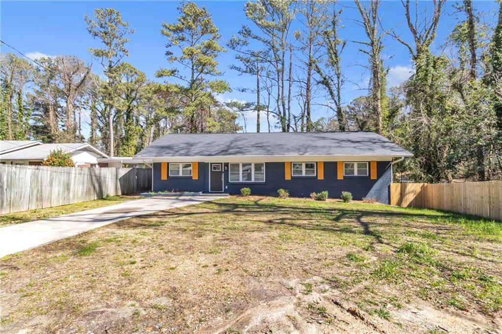 2256 Barge Road Southwest Atlanta, GA 30331 - Photo 1 of 1 a front view of a house with a yard
