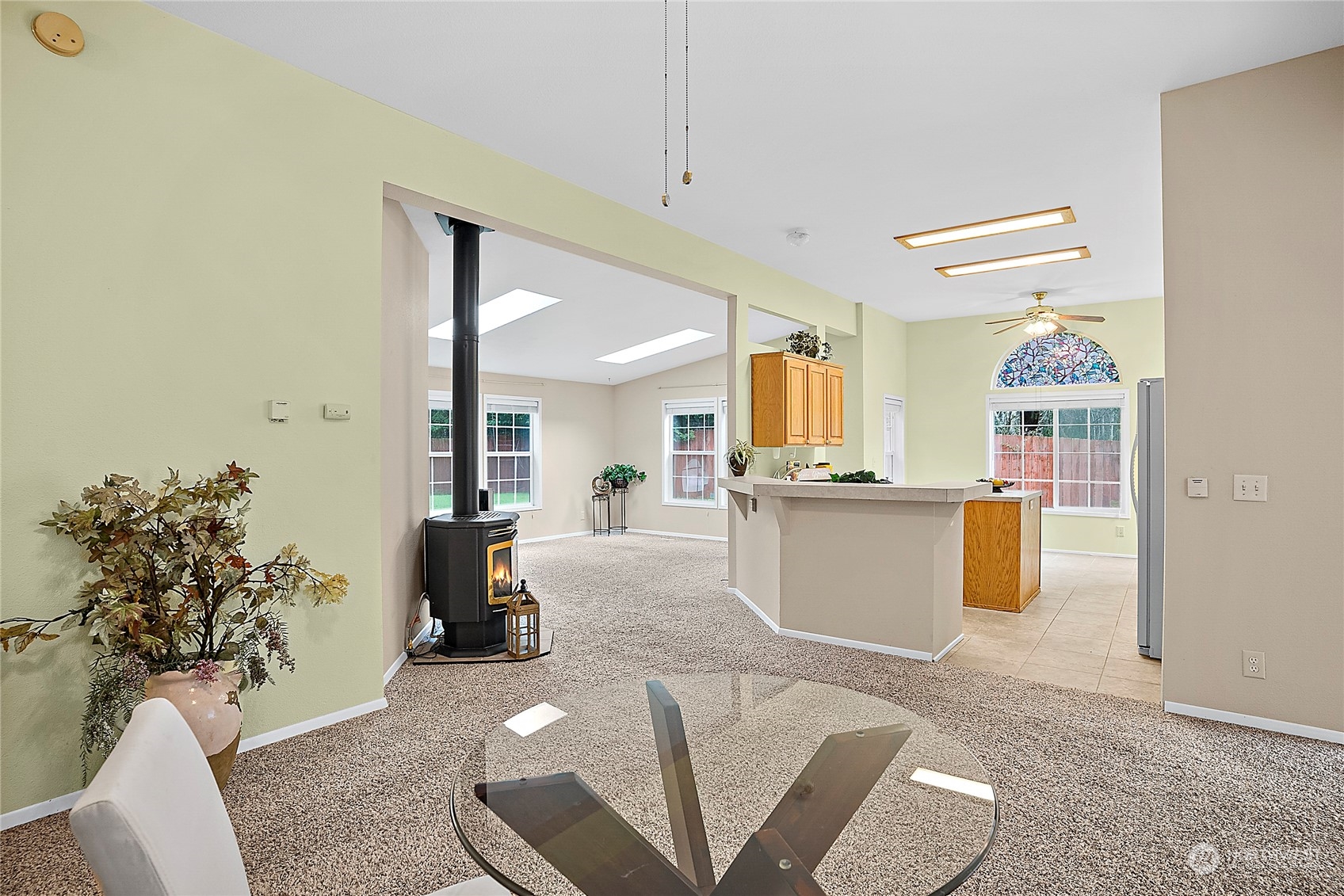 1230 East Jared Road Shelton, WA 98584 - Photo 15 of 40 a living room with furniture and a chandelier