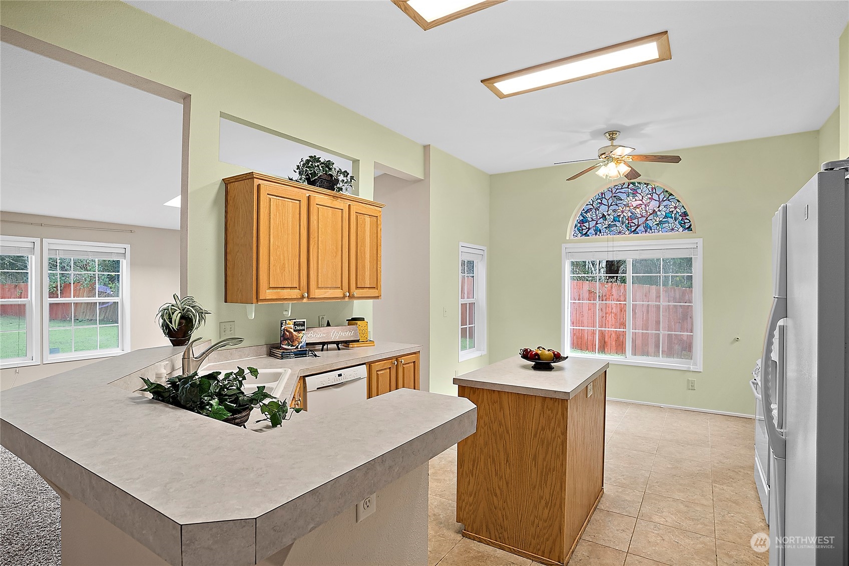 1230 East Jared Road Shelton, WA 98584 - Photo 16 of 40 a kitchen with a sink a counter top space and a window