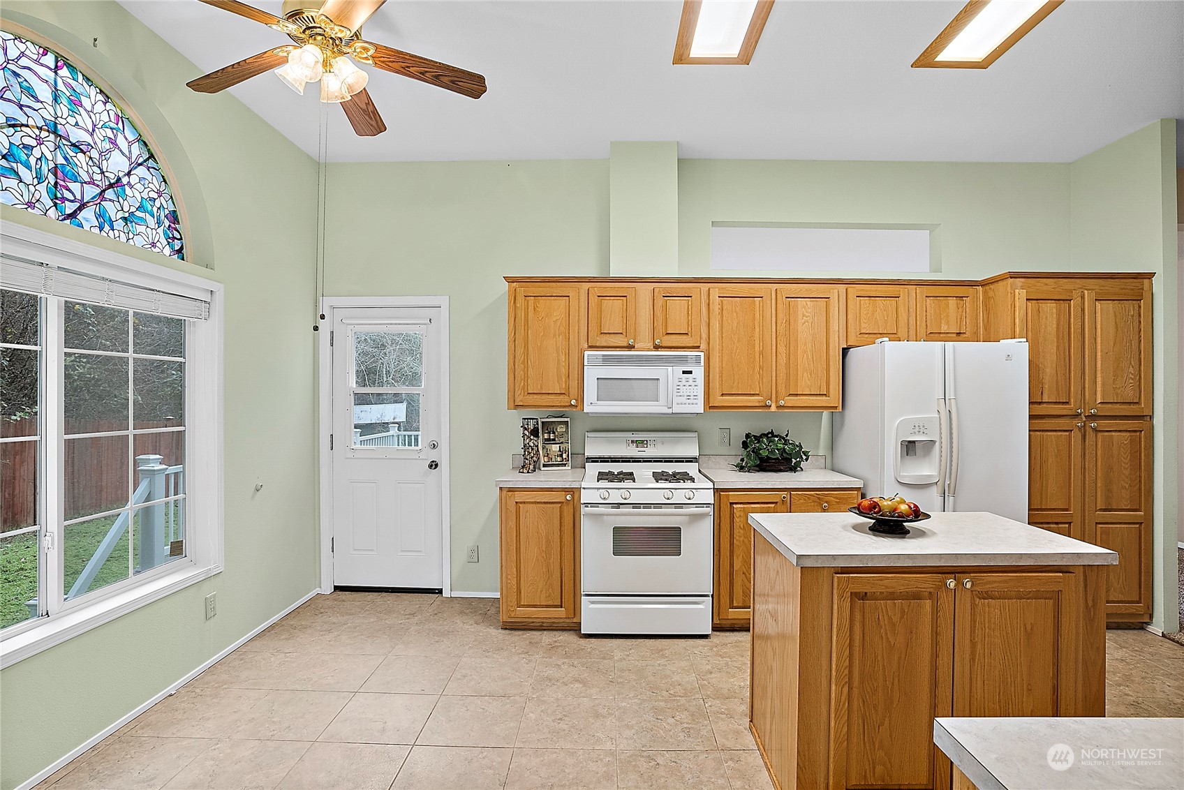 1230 East Jared Road Shelton, WA 98584 - Photo 20 of 40 a kitchen with stainless steel appliances a stove a refrigerator and a sink