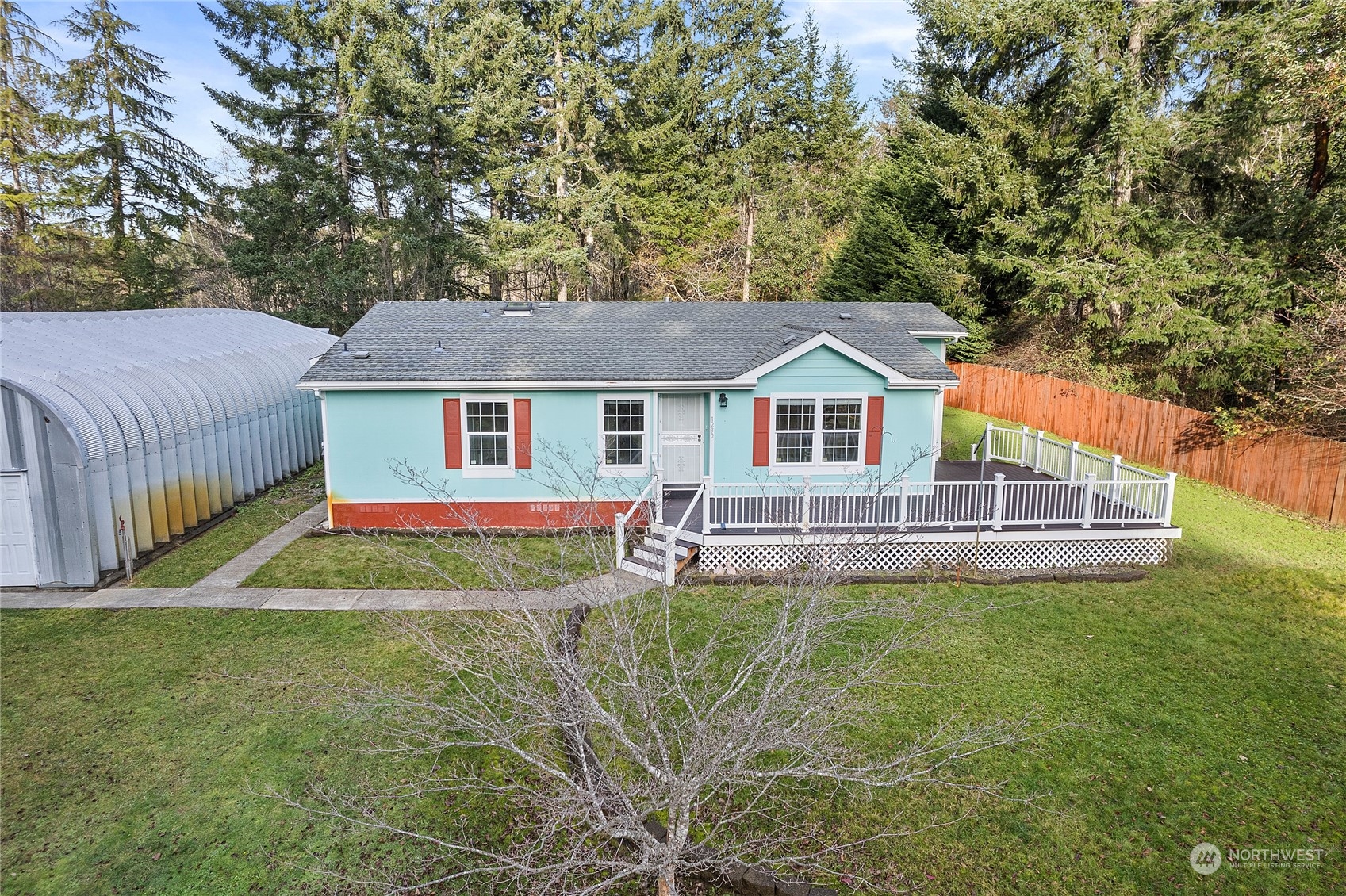 1230 East Jared Road Shelton, WA 98584 - Photo 2 of 40 a house view with swimming pool and garden space