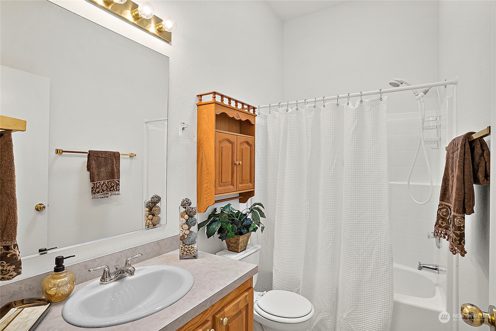 1230 East Jared Road Shelton, WA 98584 - Photo 27 of 40 a bathroom with a sink toilet and shower
