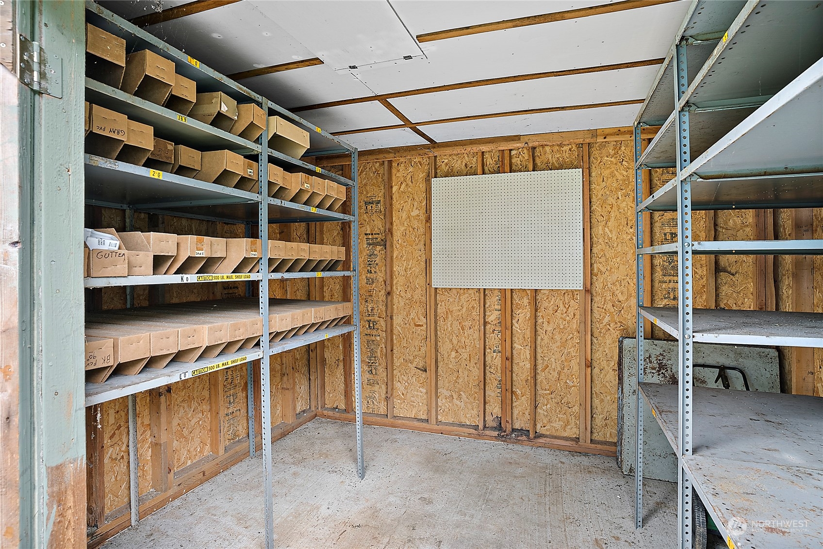 1230 East Jared Road Shelton, WA 98584 - Photo 36 of 40 a view of walk in closet with clothes and shoes