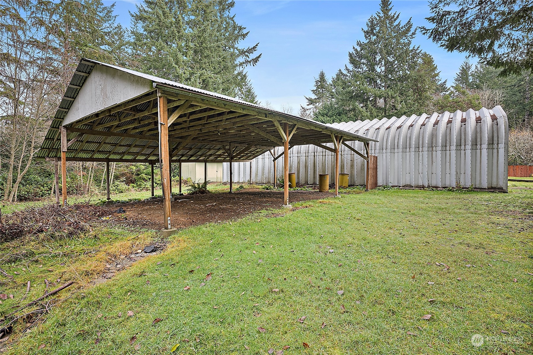 1230 East Jared Road Shelton, WA 98584 - Photo 7 of 40 a view of backyard with small cabin