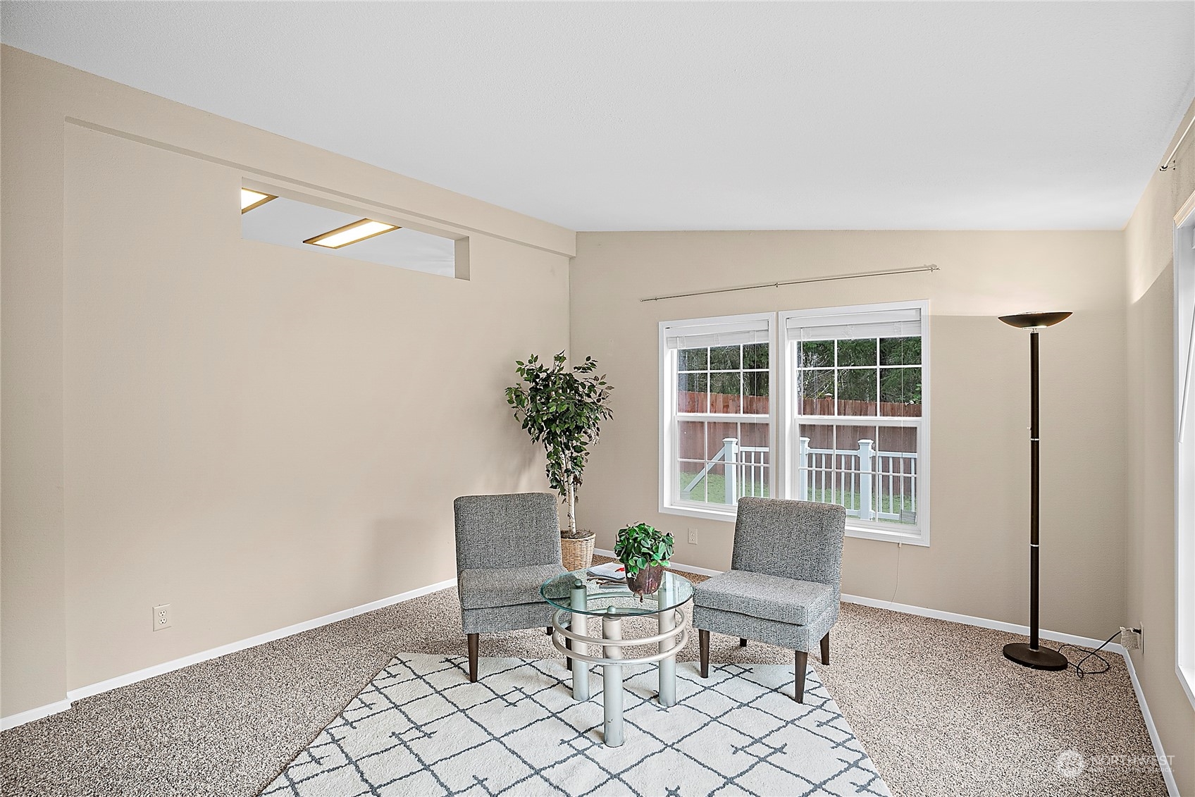1230 East Jared Road Shelton, WA 98584 - Photo 10 of 40 a living room with furniture a window and a potted plant