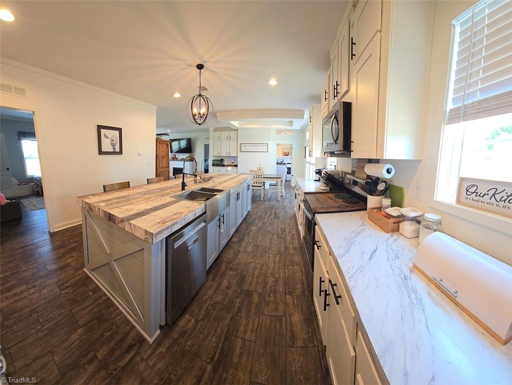 1266 Quaker Church Road Siloam, NC 27047 - Photo 13 of 29 View toward living and dining areas
