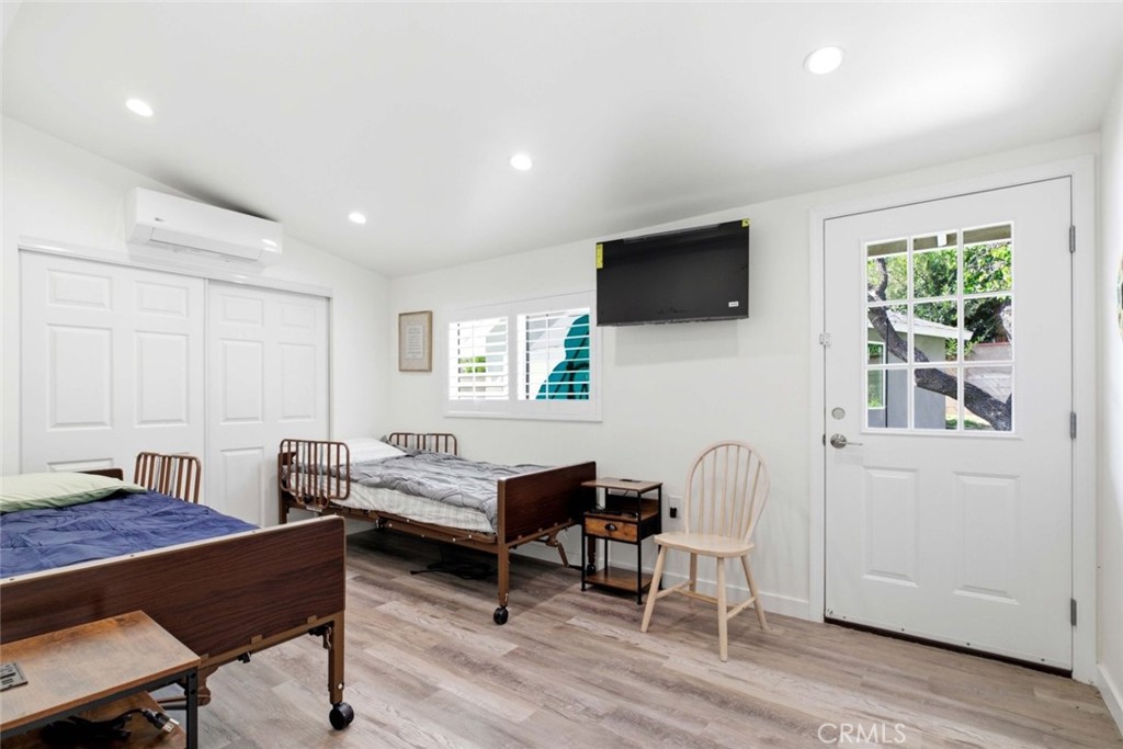 301 West Ashby Street Azusa, CA 91702 - Photo 74 of 75 a living room with furniture a flat screen tv and a window