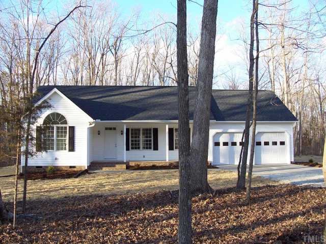 1458 Tom Oakley Road Timberlake, NC 27583 - Photo 1 of 1 a view of a yard in front of a house