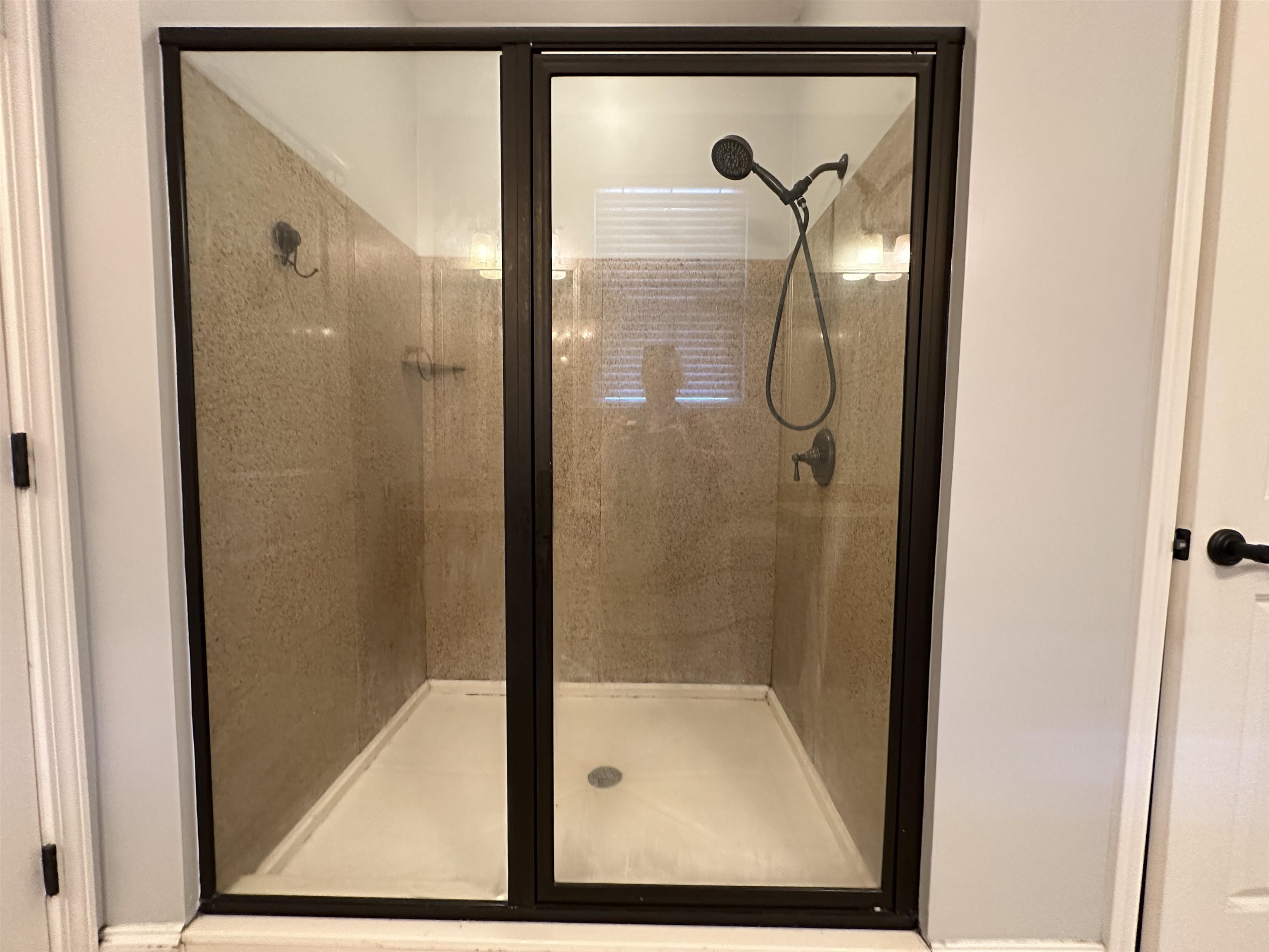 75 Shoemaker Court, Unit 304 Memphis, TN 38103 - Photo 13 of 25 Bathroom with an enclosed shower