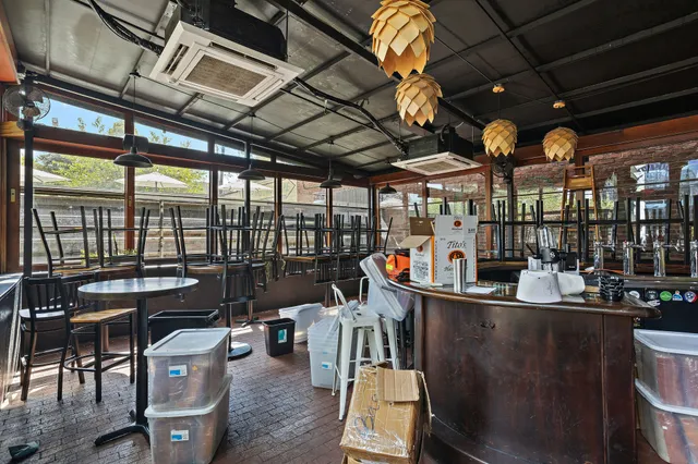 a utility room with dryer washer and other items