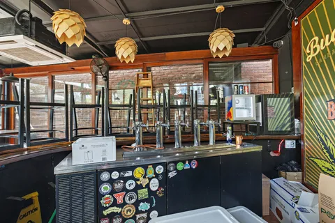 a view of a chairs and table in the patio