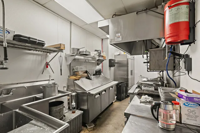 a view of a chairs and table in a patio
