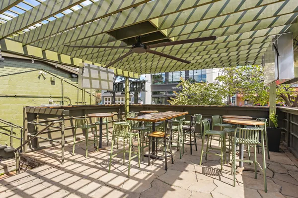 a view of a swimming pool with a lounge chair