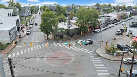 an aerial view of a city with lots of residential buildings