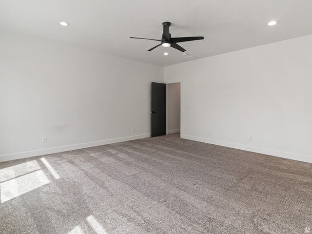 130 East 7085th South, Unit 3 Midvale, UT 84047 - Photo 10 of 30 Carpeted empty room with a ceiling fan and recessed lighting