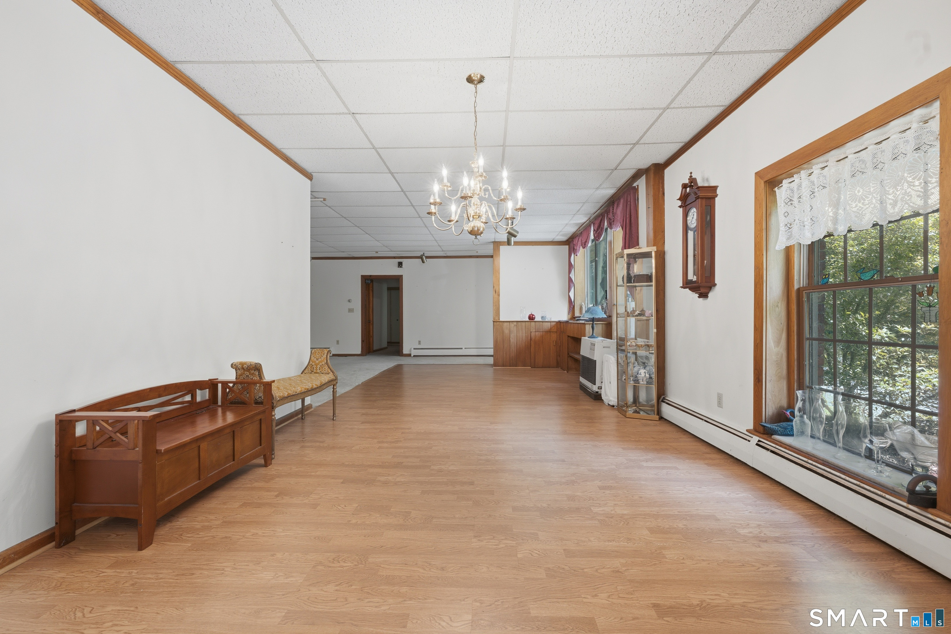 345 Rimmon Road Woodbridge, CT 06525 - Photo 4 of 40 First floor living/dining area