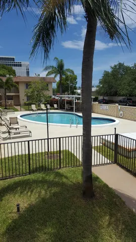 a view of a backyard with a deck