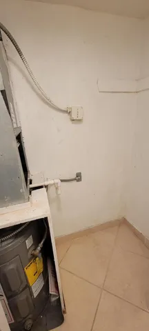 a kitchen with kitchen island sink refrigerator and stove