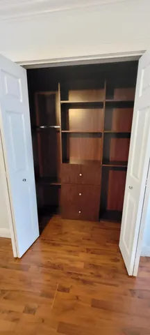 a kitchen with stainless steel appliances granite countertop a sink and a stove