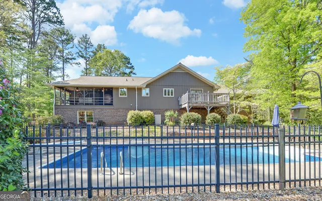 a view of outdoor space with trees all around