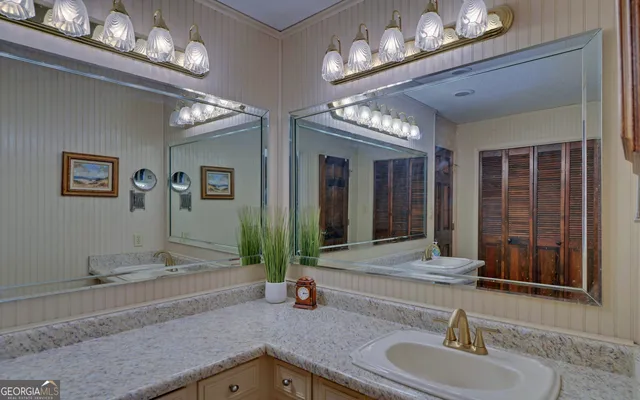 a bathroom with a shower curtain and window