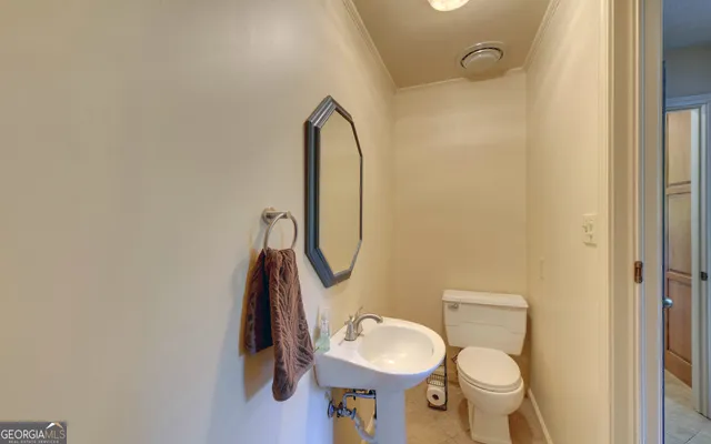 a view of a chairs and tables in the back yard