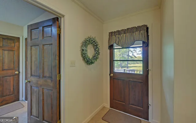 a view of a grassy field with trees