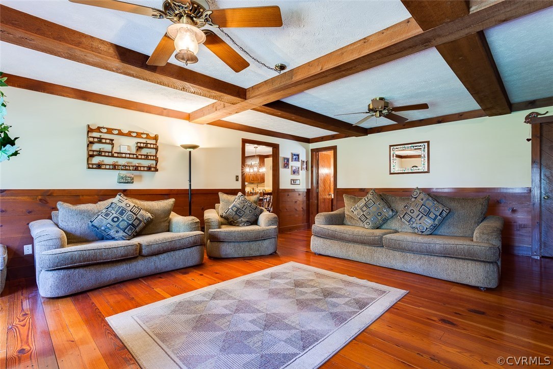15210 Harrowgate Road Chester, VA 23831 - Photo 11 of 26 a living room with furniture and a rug