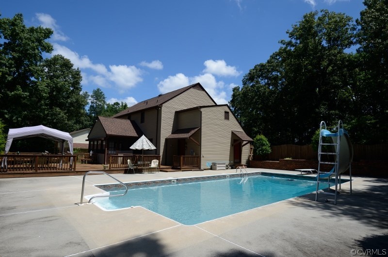 15210 Harrowgate Road Chester, VA 23831 - Photo 3 of 26 a view of pool with outdoor seating
