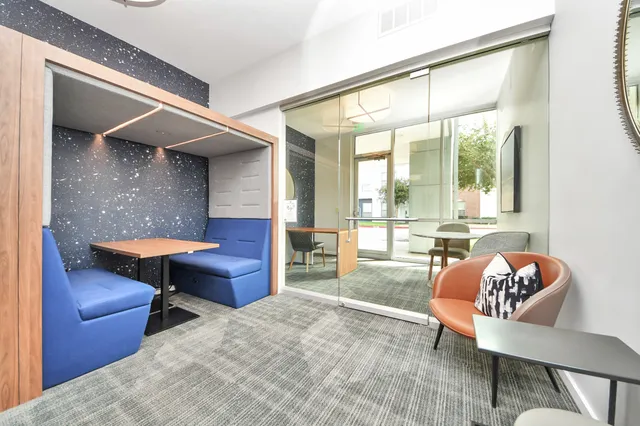 a kitchen with stainless steel appliances a refrigerator sink and microwave