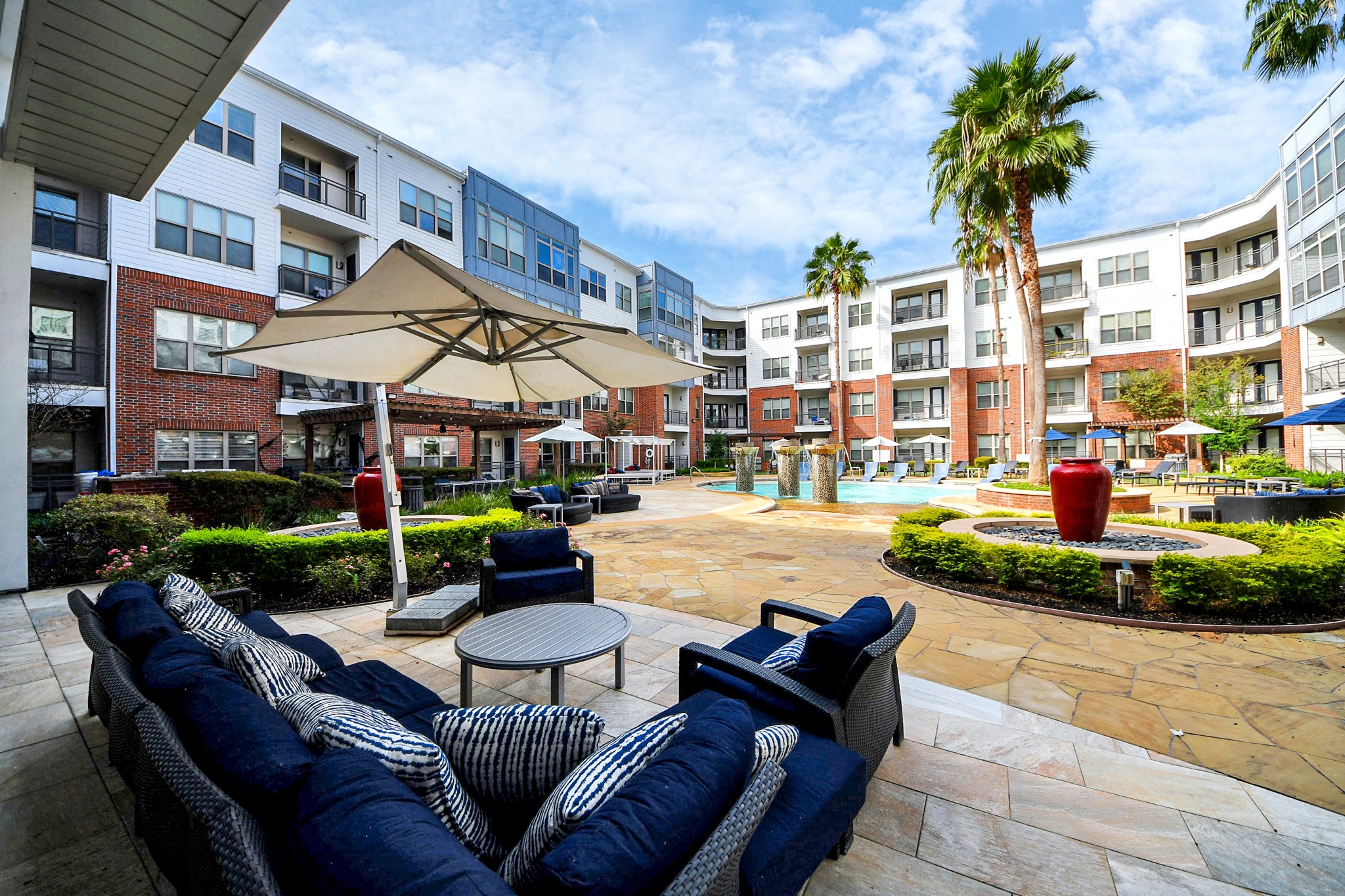 5455 Richmond Avenue, Unit 4086 Houston, TX 77056 - Photo 14 of 50 a view of a swimming pool with a patio