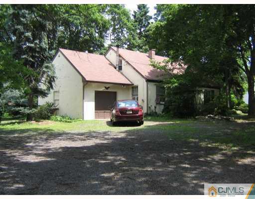 100 Ethel Road Edison, NJ 08817 - Photo 1 of 1 a car parked in front of a house