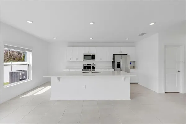 $400,000 | 557 Pink Ibis Bend, St. Cloud, FL 34772