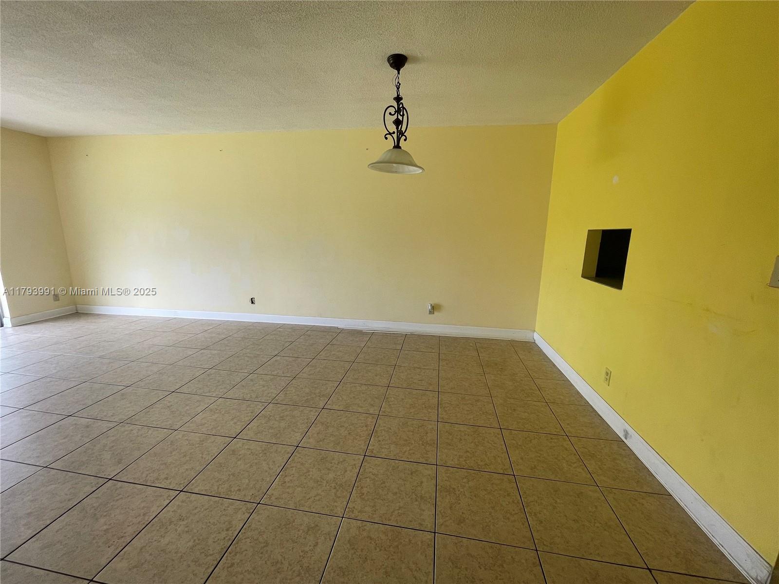 4200 Northwest 3rd Court, Unit 134 Plantation, FL 33317 - Photo 11 of 15 a view of a room with an empty space