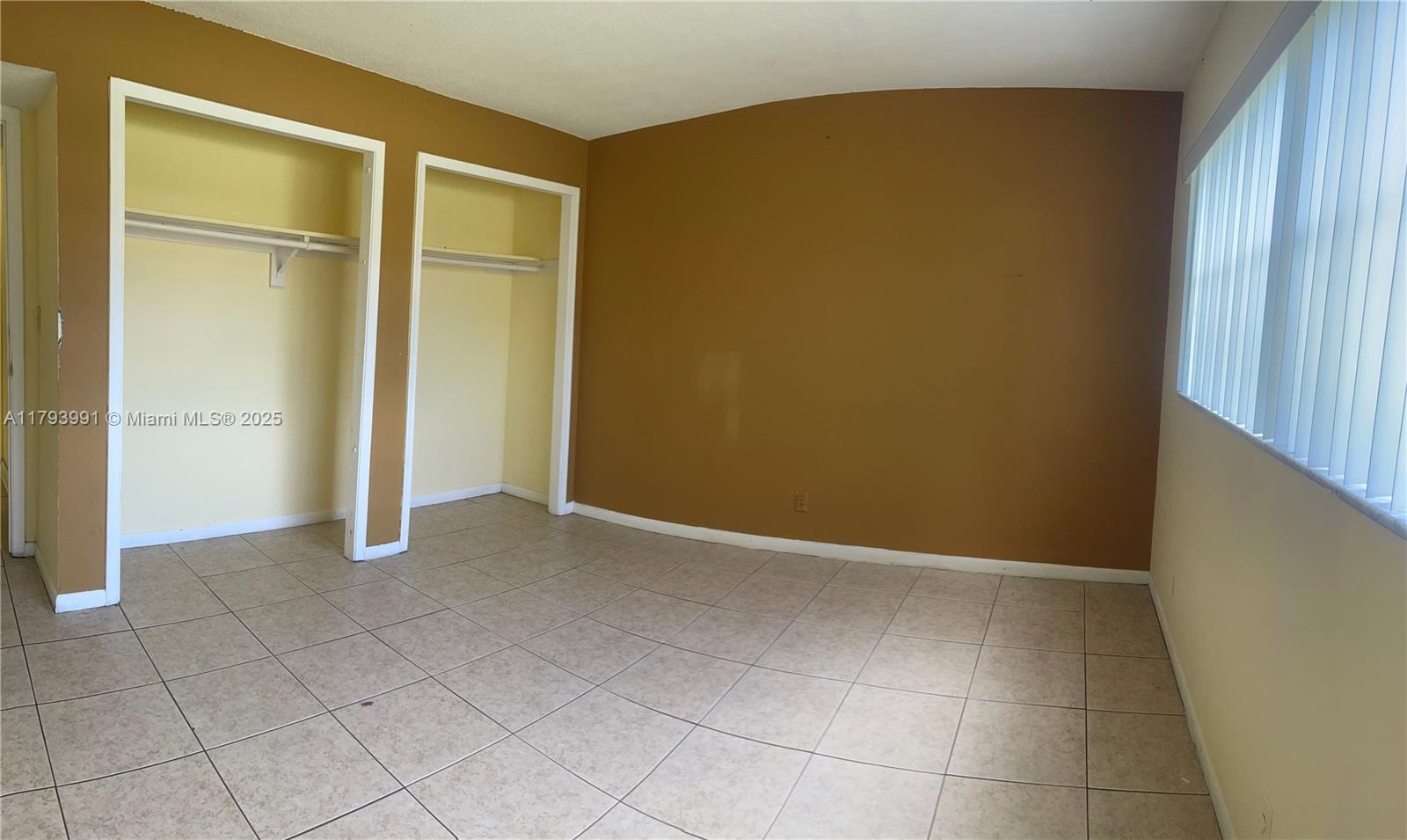 4200 Northwest 3rd Court, Unit 134 Plantation, FL 33317 - Photo 13 of 15 an empty room with closet