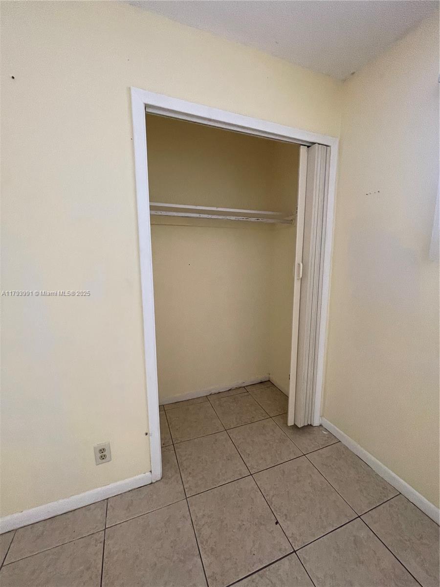4200 Northwest 3rd Court, Unit 134 Plantation, FL 33317 - Photo 15 of 15 an empty room with closet