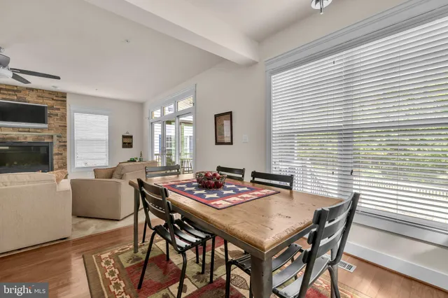 a view of balcony with wooden floor