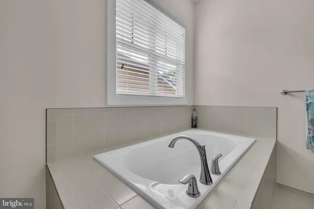 a bathroom with a shower and a toilet