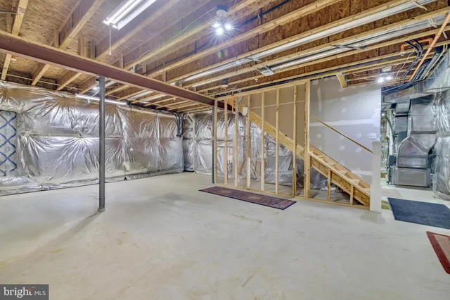 a view of a room with wooden walls