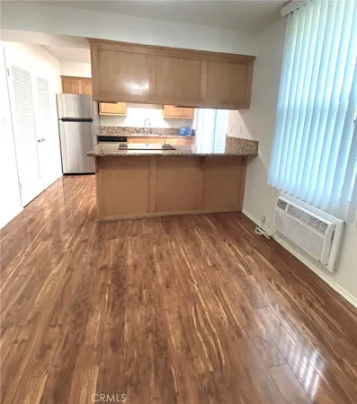 a utility room with a sink washer and dryer