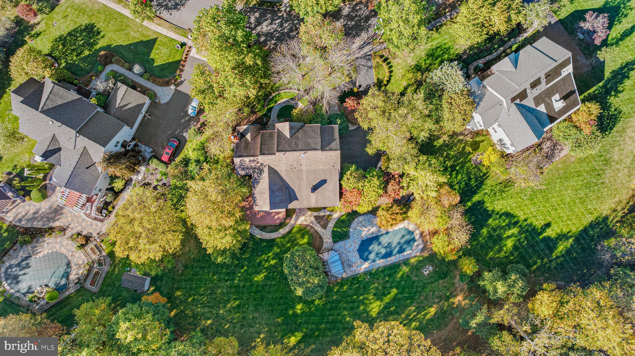 6 Howell Court Princeton Junction, NJ 08550 - Photo 11 of 81 an aerial view of residential house with outdoor space and trees all around