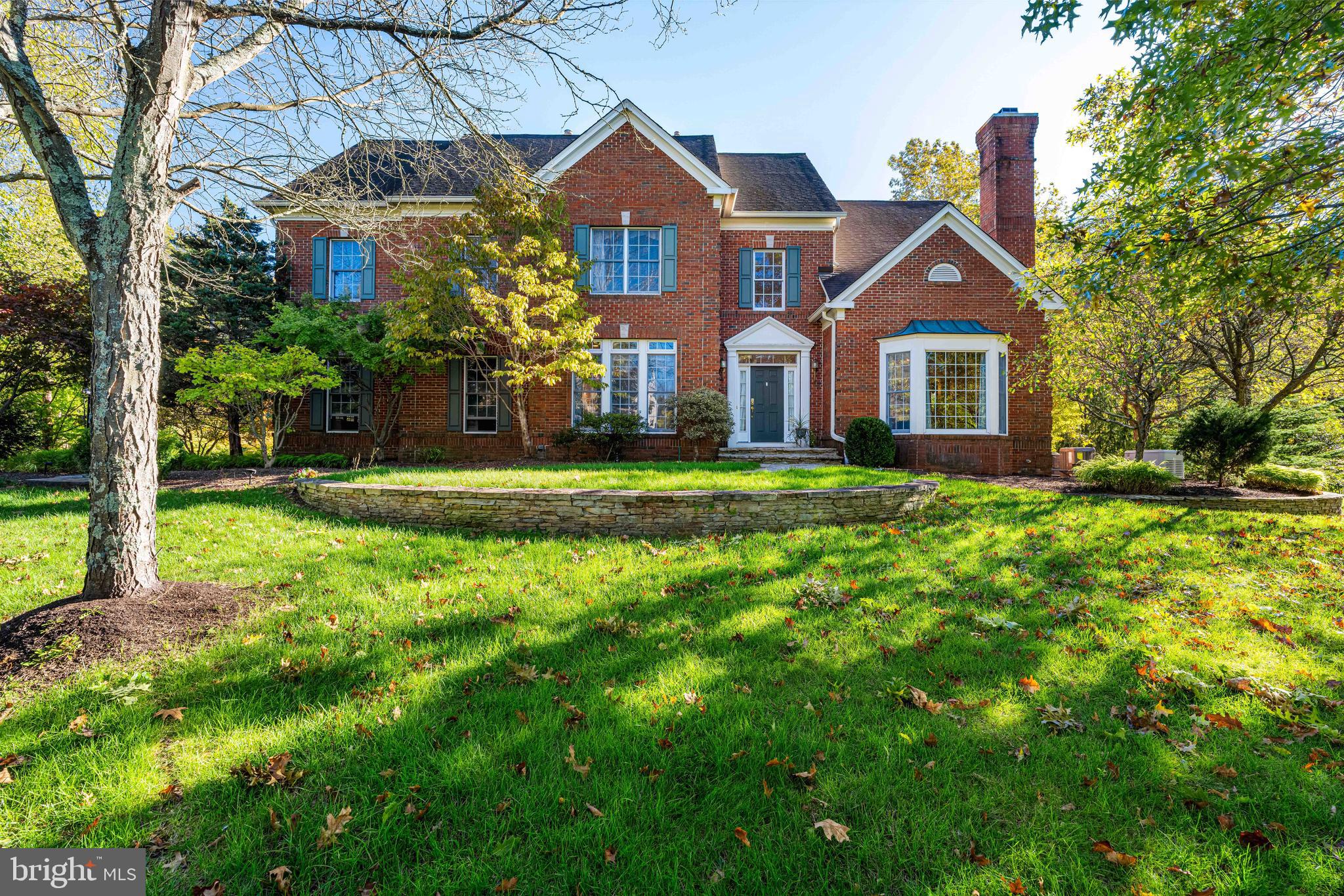 6 Howell Court Princeton Junction, NJ 08550 - Photo 12 of 81 a front view of a house with a yard