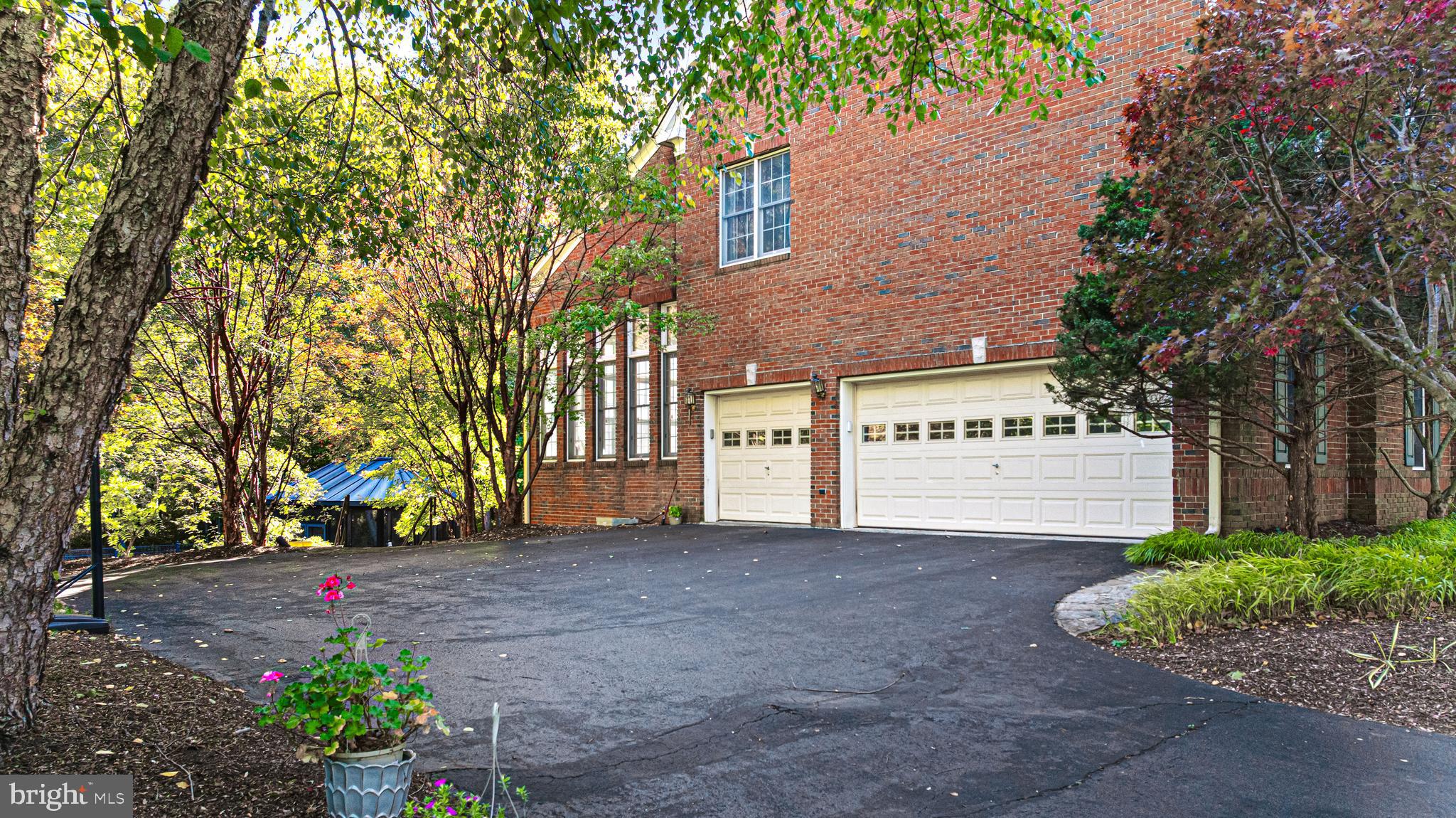 6 Howell Court Princeton Junction, NJ 08550 - Photo 13 of 81 a view of a building with a garden and trees