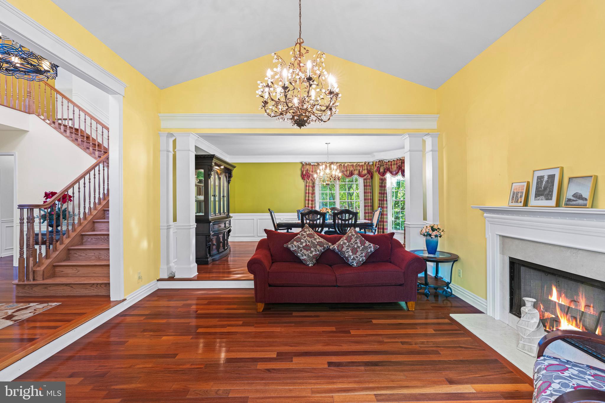 6 Howell Court Princeton Junction, NJ 08550 - Photo 19 of 81 a living room with furniture chandelier and a fireplace
